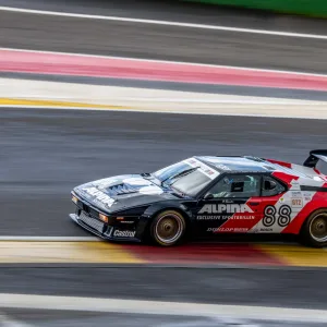 BMW M1 at full speed as it drives up the Raidillon